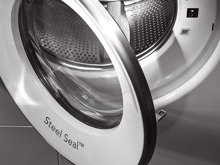Nærbillede af døren i en frontbetjent vaskemaskine